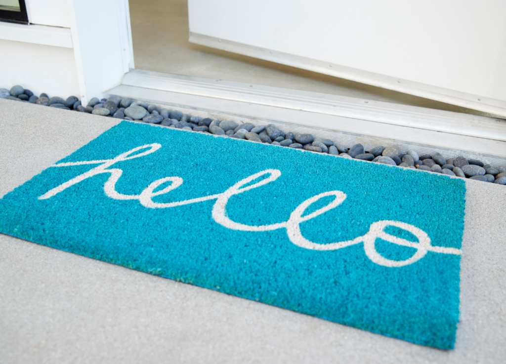 Doormat that says Hello