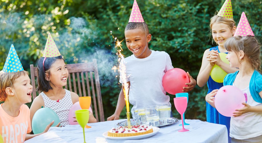 Children celebrating a birthday.